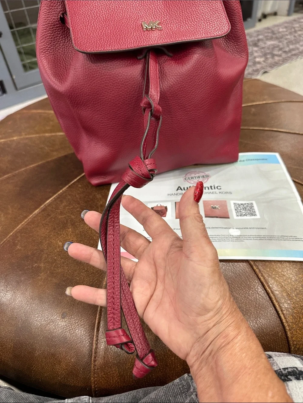 MICHAEL Michael Kors Junie Red Pebbled Leather Drawstring Backpack